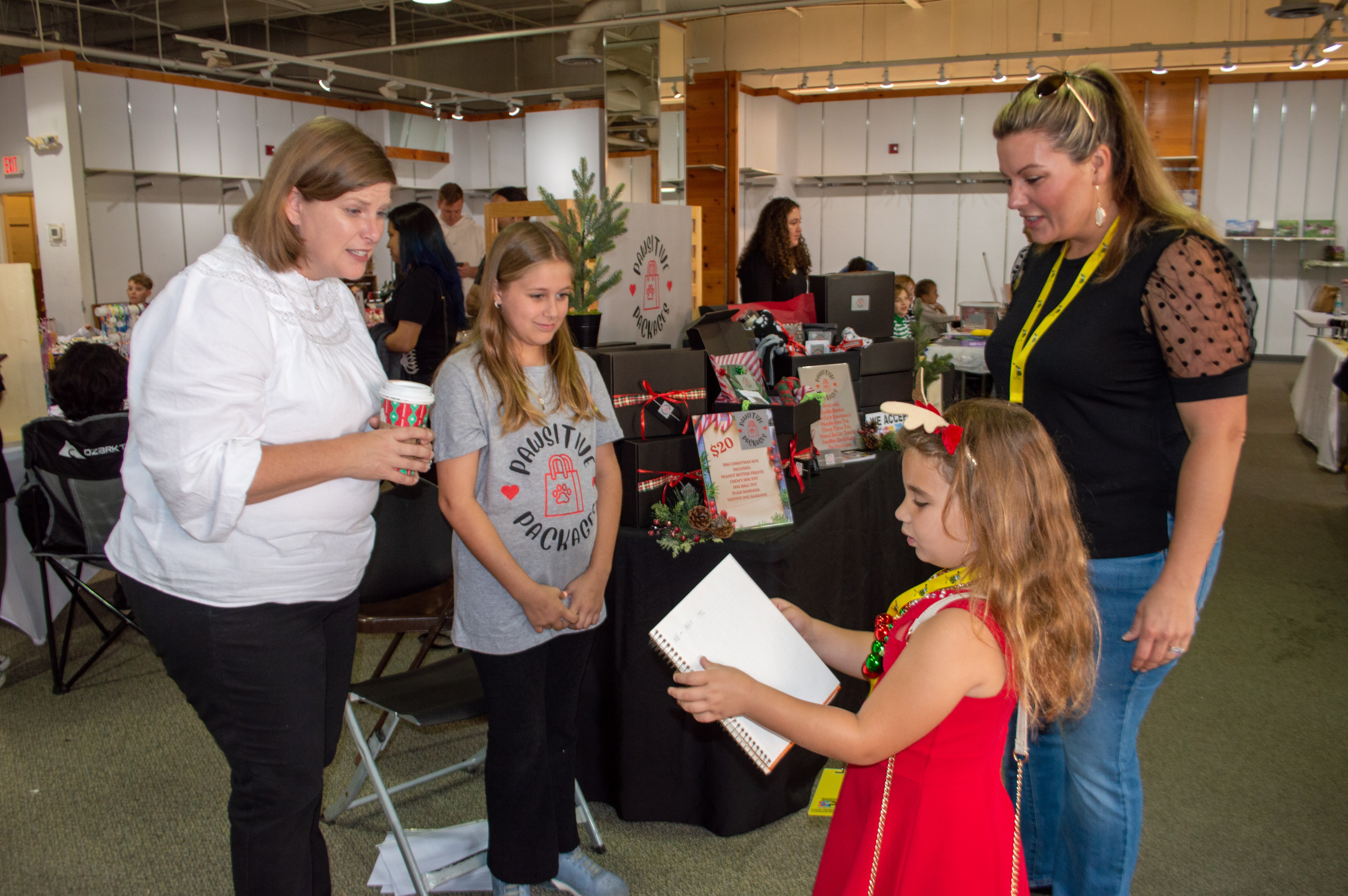Abriel-Cohen-7-asks-Kyleigh-See-10-questions-about-her-Pawsitive-Packages-booth-during-the-Biz-Kidz-Expo