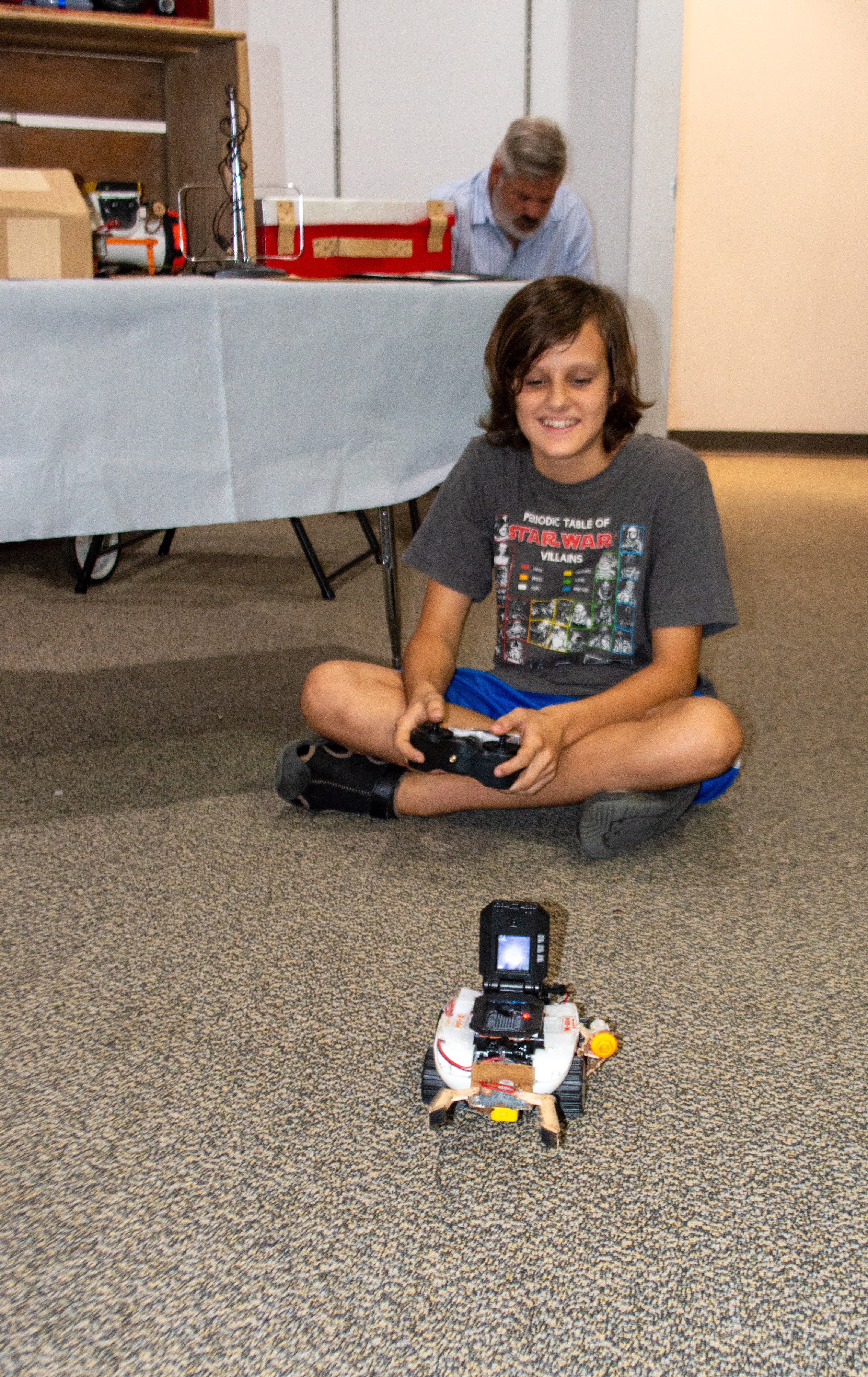 Ben-Jarvis-12-shows-off-one-of-the-many-homemade-robots-he-designed-by-taking-parts-from-other-devices