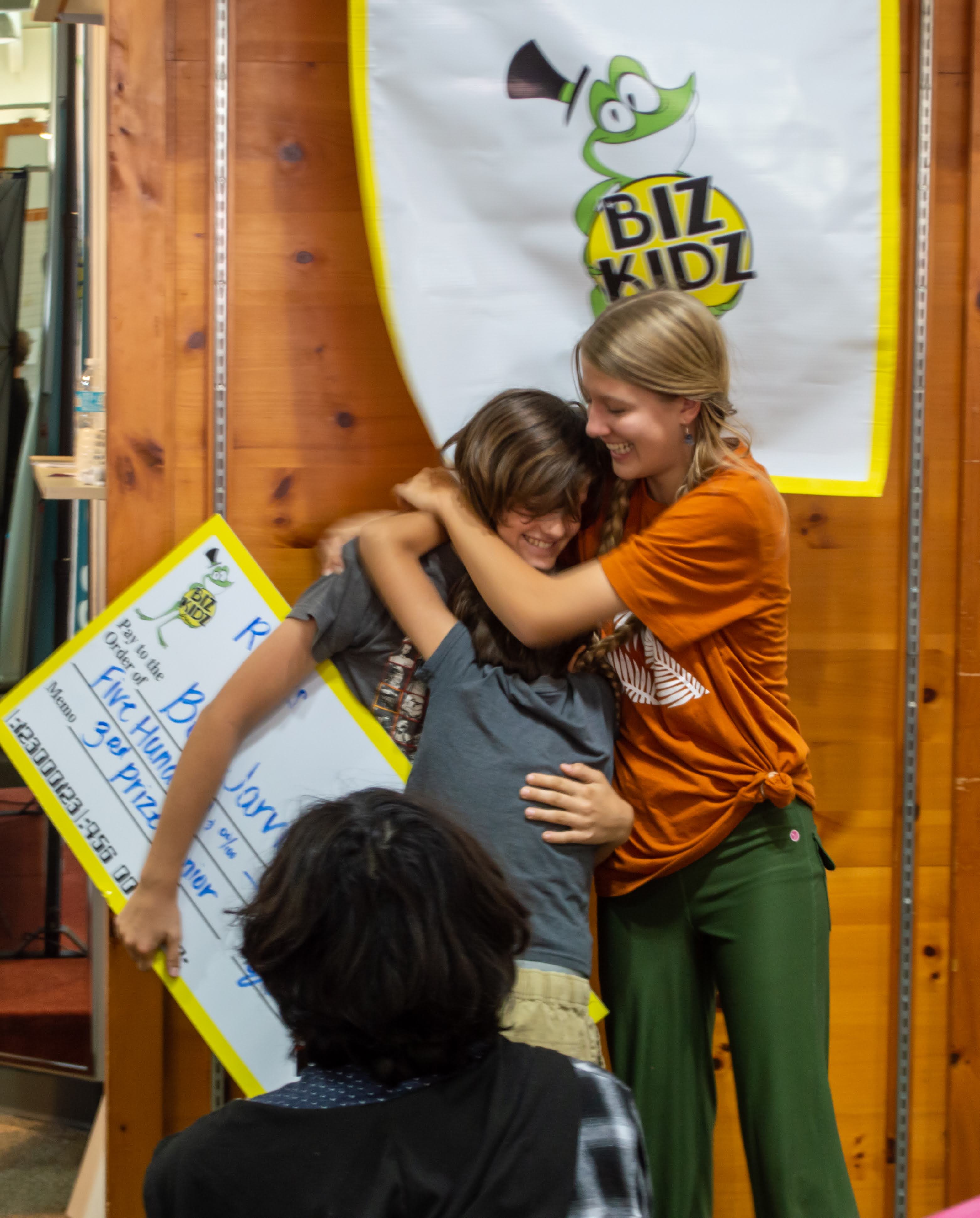 Ben-Jarvis-gets-hugs-from-his-siblings-after-winning-third-place