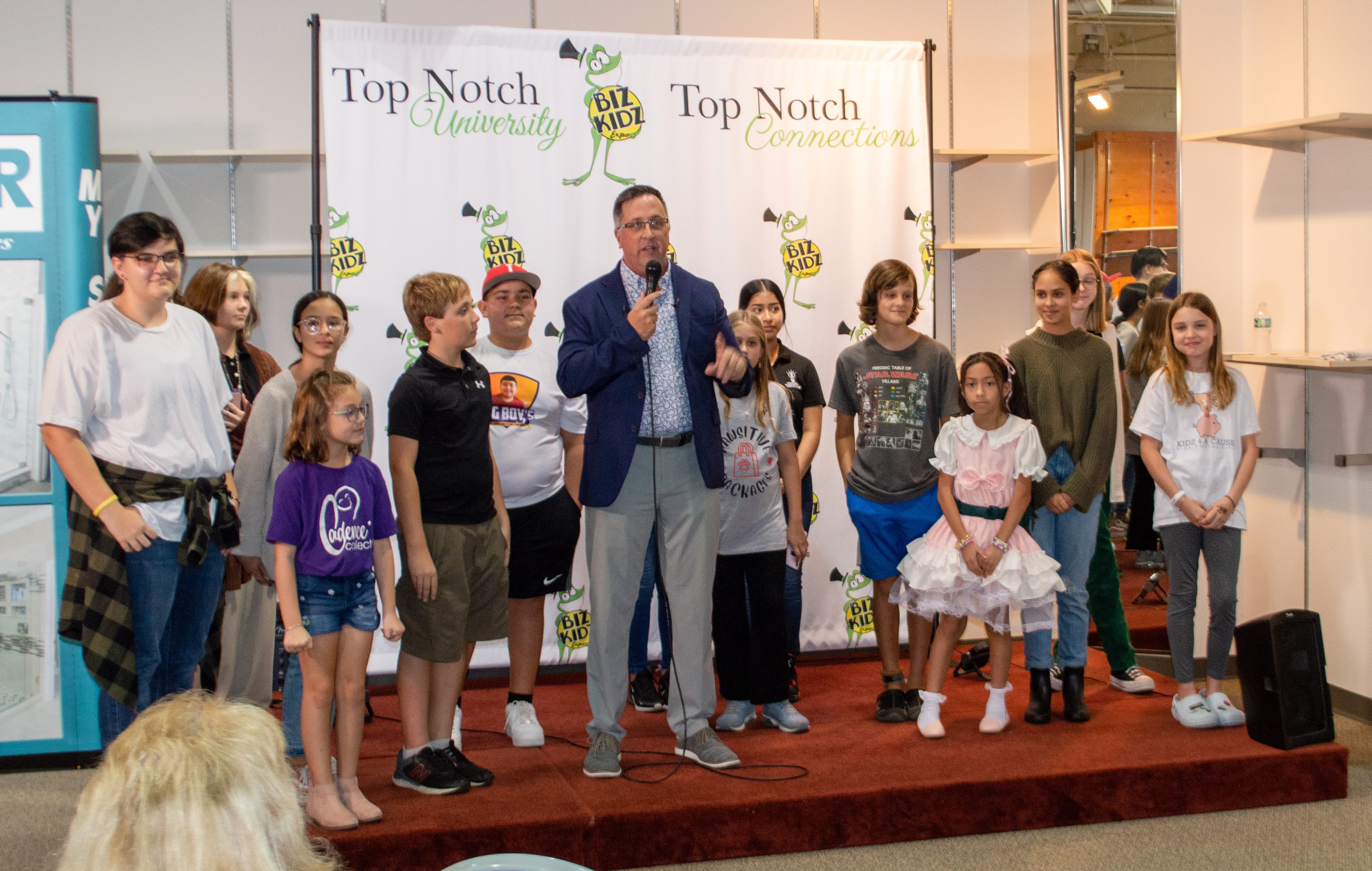 J.D.-Ribali-co-founder-of-the-Biz-Kidz-Expo-recognizes-children-who-sold-at-least-100-worth-of-items