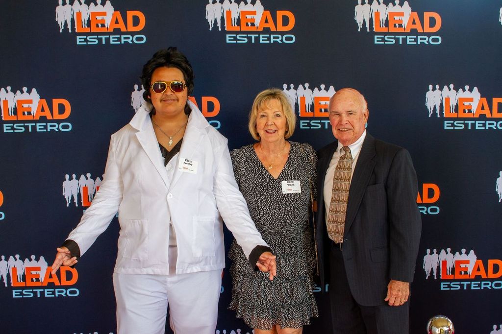 Carol-and-Jim-Ward-pose-with-Elvis