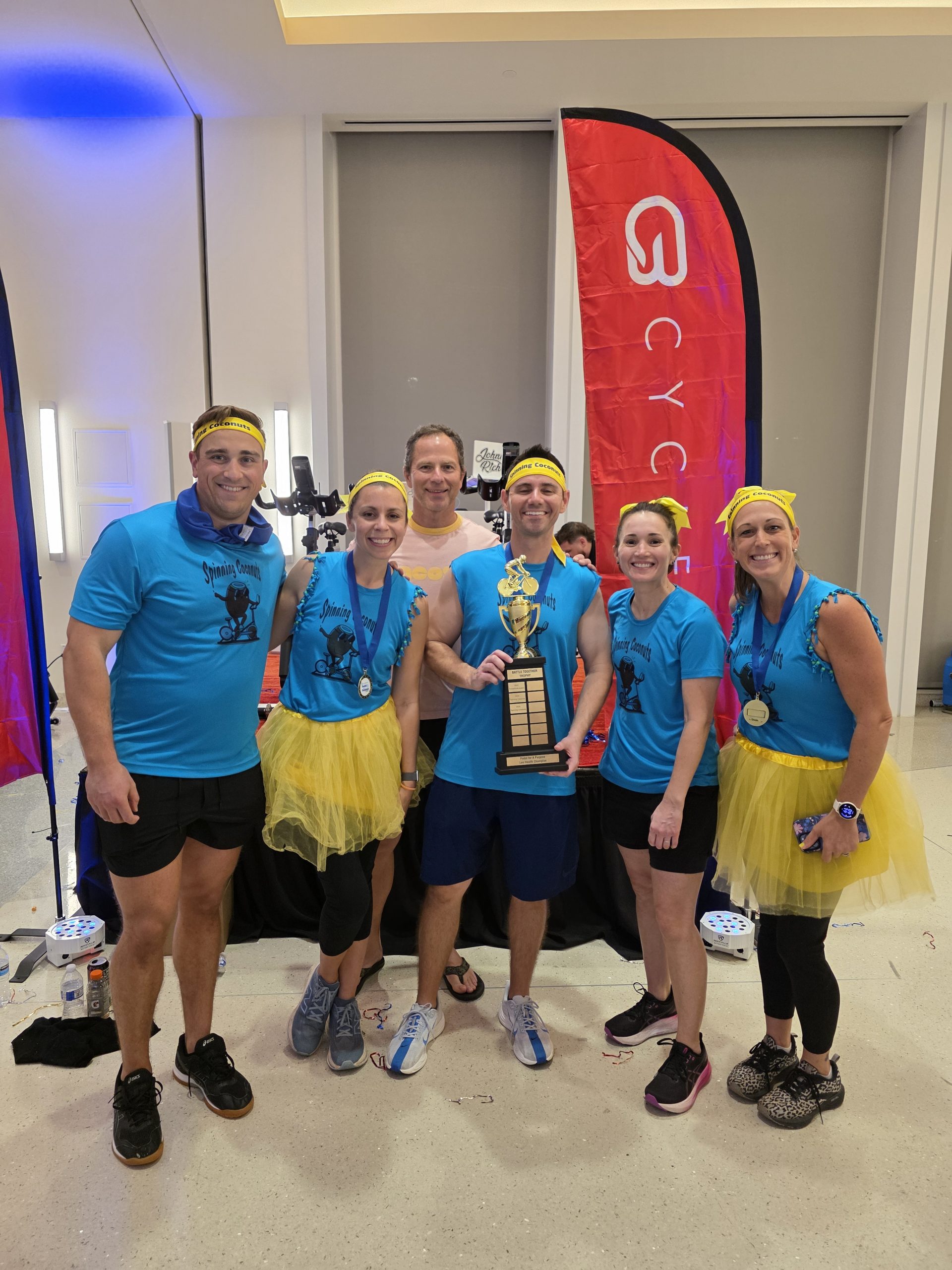 Spinning-Coconuts-Lee-Health-Battle-Together-Trophy-Winners-scaled