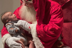 1_Santa-cuddles-one-of-the-newest-members-of-the-community