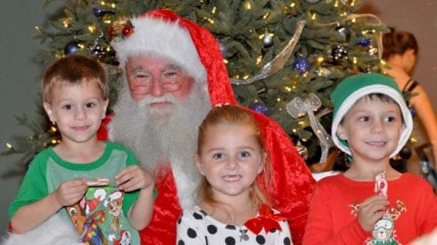 Santa (Dave Ott) with Lucas and Nicholas Levesque and Melanie Ward