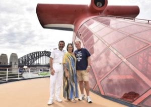Leanne and Mark Weston, of Australia, with Carnival Spirit Captain Vittorio Marchi, cruised 21 times in 2018