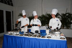 Freddy Figueroa, Callie Layne and Tyler Thompson prepare crepes