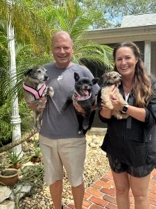 Kenny and Sara James with Lila_ Mia_ and Marley after picking Marley up from True and Faithful Pet Rescue_ April 2023