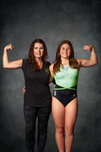 Gymnast Kallie Ackley of Gymnastics World poses for a picture with her Mom Kim at Gymnastics World