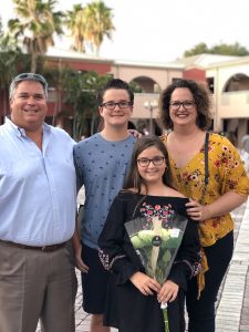 Vince Modarelli and his wife Natalie with son Vincent and daughter Sophia at Estero High School