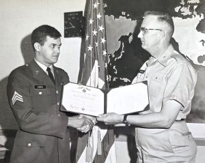 Sergeant Chapin is presented with the award for heroism by Colonel Rames at the Pentagon_ 1969.