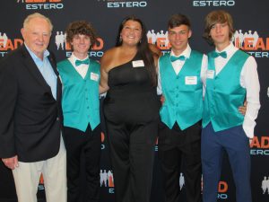 Jim Shields with Bryce Kronfeldt_ Sydney Ramsey_ Jeffrey and Matthew Stevens at the 2023 Breaking Par event