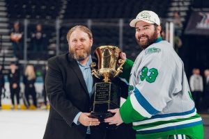 ECHL Commissioner Ryan Crelin presents the June M. Kelly MVP Award to Cam Johnson 